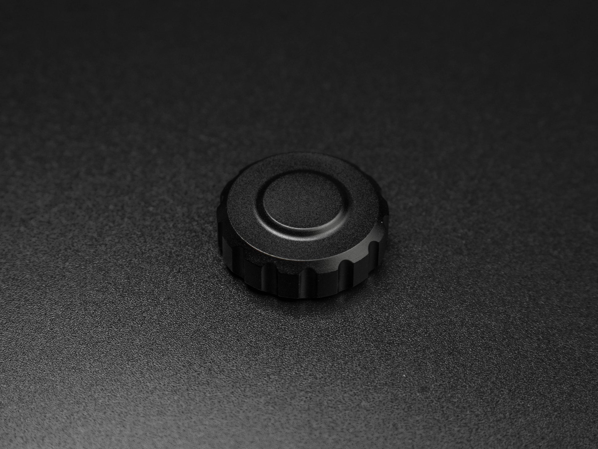 Black GT-style thumb rotary encoder knob for sim racing