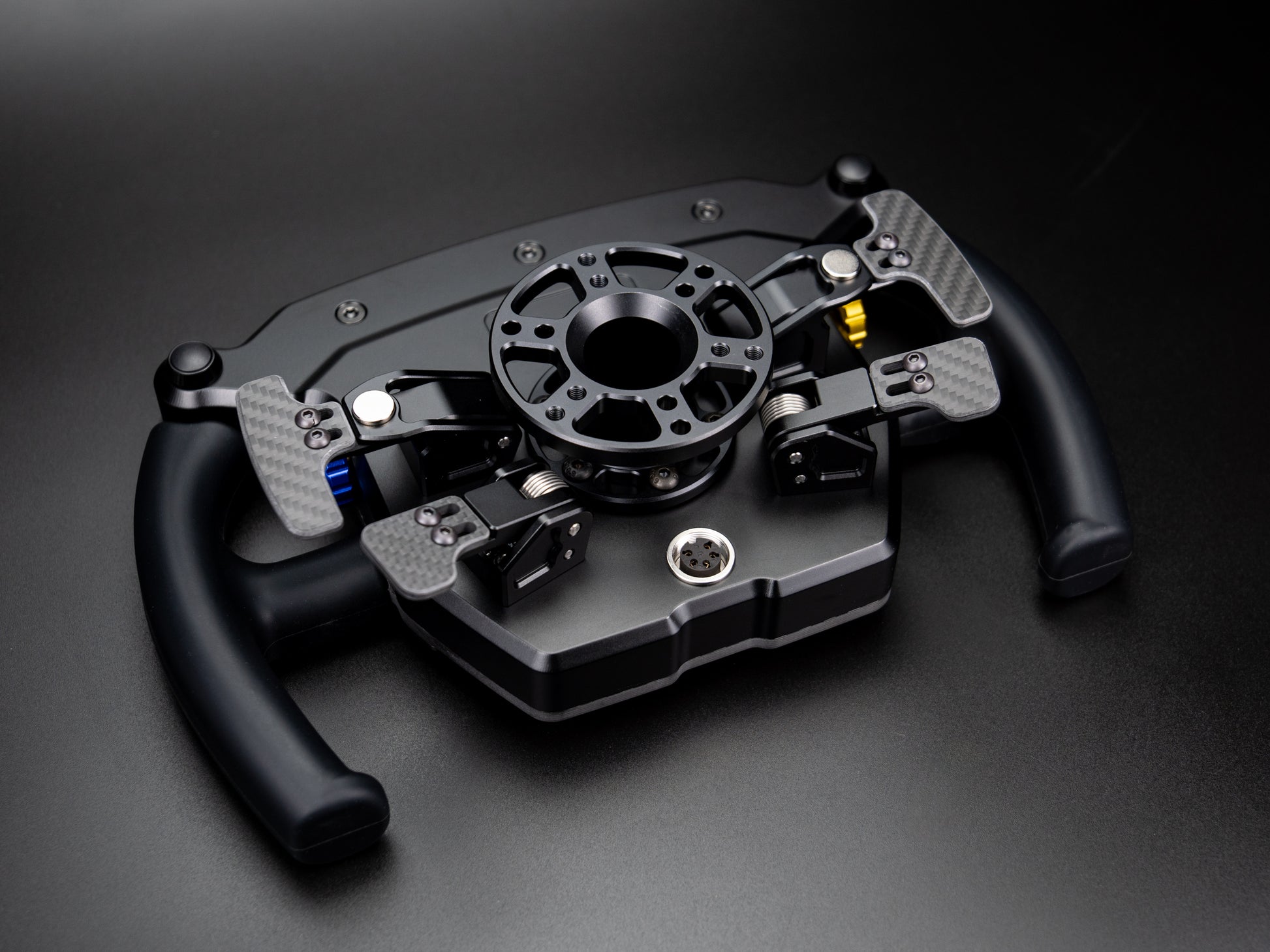 Full aluminum enclosure of the LMPH V2 hypercar sim racing steering wheel with dual-clutch system