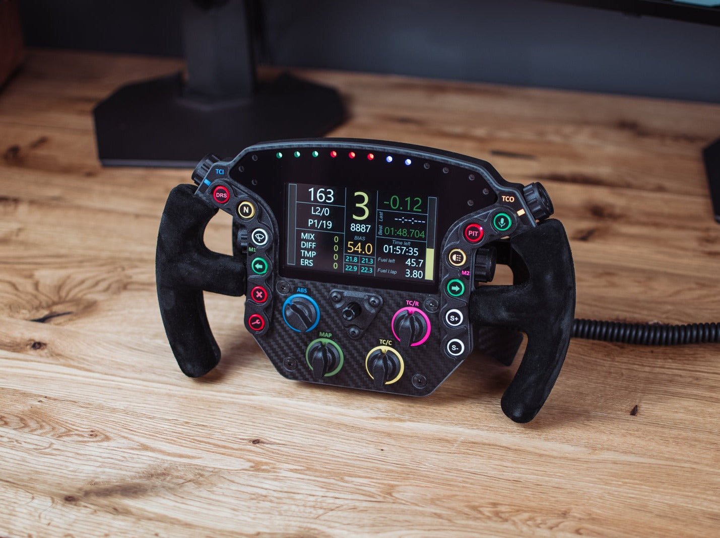 GTE PRO V2 steering wheel from front with funky switch